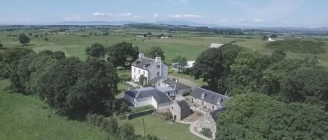 Aerial view of the property with sea and islands out to the west