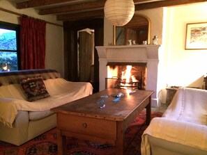 large sitting room and open fire , logs provided 