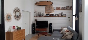 Salon communiquant avec bureau