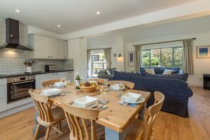 Wedge Cottage, Roserrow. Ground floor: Kitchen with sitting room beyond