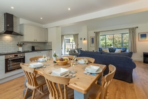 Wedge Cottage, Roserrow. Ground floor: Kitchen with sitting room beyond