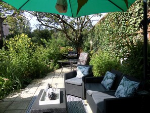 patio 2024 large table and chairs comfortable lounge furniture to sit and read.