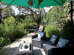 patio 2024 large table and chairs comfortable lounge furniture to sit and read.