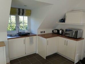 Kitchen, with fridge, dishwasher and microwave