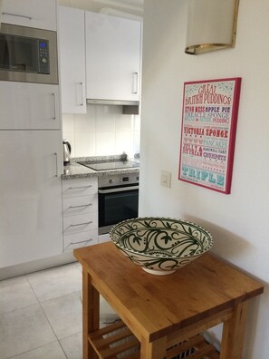 Kitchen leading to hall