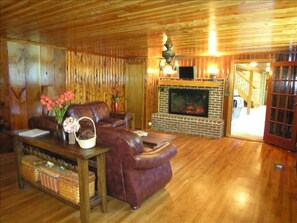 Family Room #1 off the dining area with new leather couches, flat screen tv!