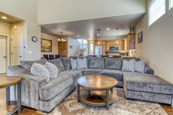 Spacious open-concept great room with gourmet kitchen and room to gather