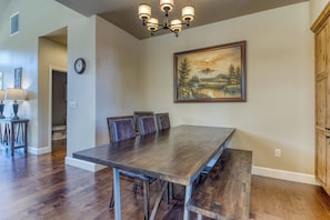 Gather for meals or game night at the spacious dining table for eight