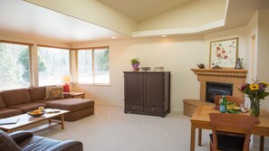 View of living room including gas fireplace