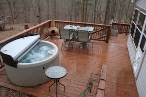 Relax in the hot tub among the Oak, Maple and Hickory forest