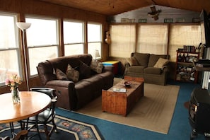 Large sunroom with 10 picture windows
