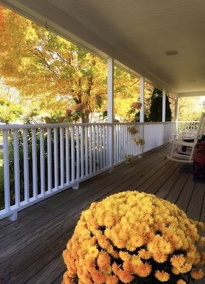 The covered patio provides a peaceful place to enjoy a fall day.