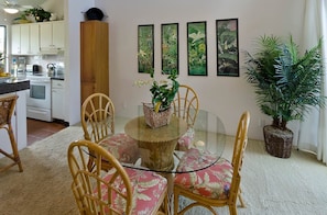 Dining area, leading into kitchen, and open to living room