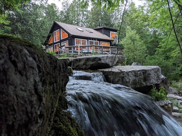 View of the cottage from across the creek