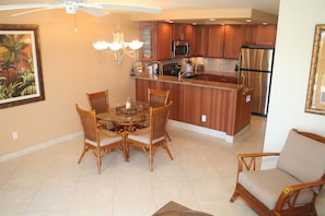 Deluxe kitchen with stainless appliances, granite counters, and tons of light.