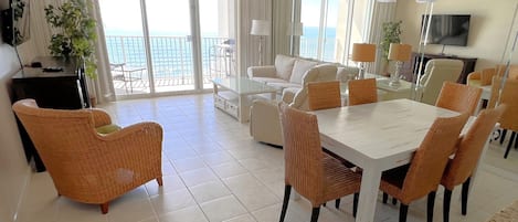 Endless water views from living, dining, kitchen.  Slipcovered sofa. Roku 55 TV.