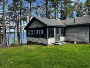 Screened in porch with lovely water views