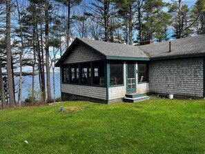 Screened in porch with lovely water views