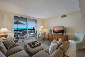 New LVP floors and West Elm rugs throughout for easy coastal living, HD Smart TV