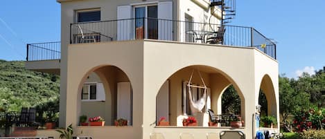 The Guest House with a full complement of verandas & balconies.