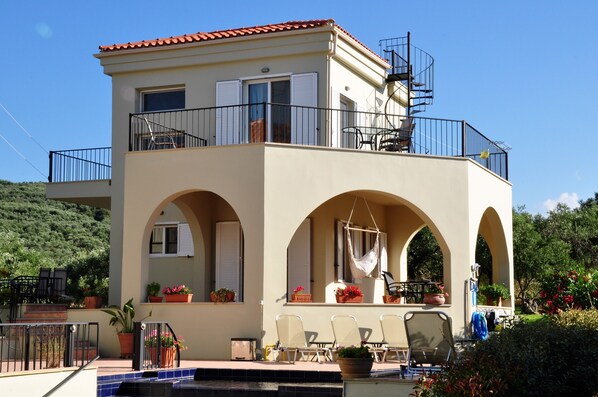 The Guest House with a full complement of verandas & balconies.