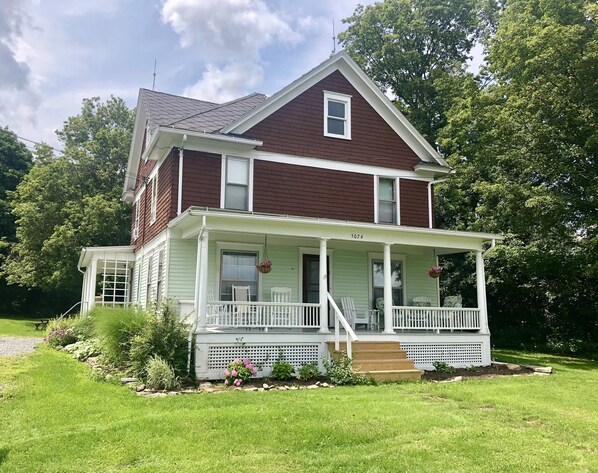 Front of house showing lovely front porch