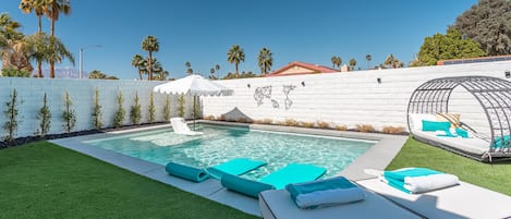 Enjoy the very private pool courtyard & the new heated pool with tanning shelf!