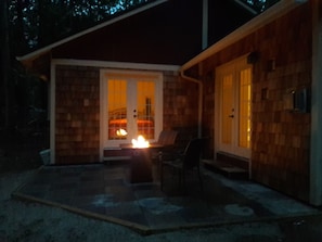 The cottage has a fire pit to make your evenings cozy
