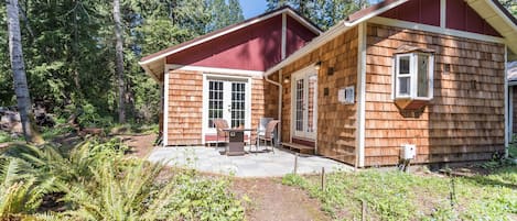 The cottage is nestled in a grove of trees but gets great light.