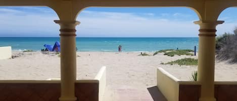 The view from your shaded lounge chair on full length Beach Patio