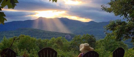 Watch the sunset in an adirondack and enjoy the show!