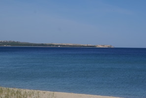 View of Sleeping Bear Point from your private  beach.