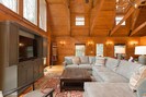 Gather together and enjoy a movie with the mountain stream in the background