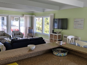 View of living area from kitchen - sliders to main deck