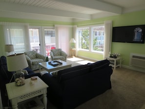 View of living area from kitchen - sliders to main deck