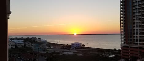 Side view from our balcony of sunset over the Santa Rosa Sound