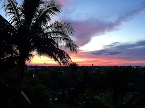 View taken from balcony of beautiful sunset