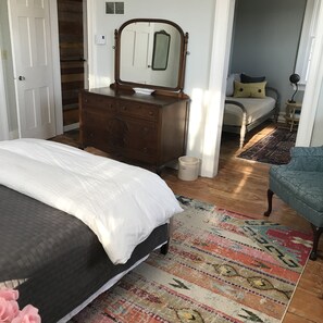 Suite has an adjoining bedroom with a daybed that converts to twin sleeping bed.