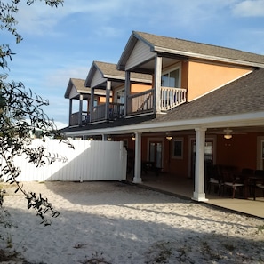 View showing 3 upstairs Master Suites overlooking pool and Santa Rosa Sound.