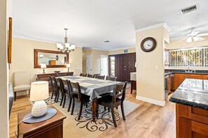 Open floor plan. Generous dining table a allows for great family meals.