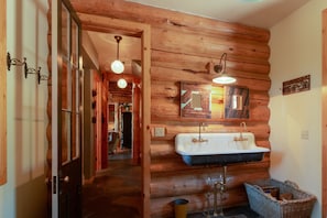 View from mud room down the hall to living room
