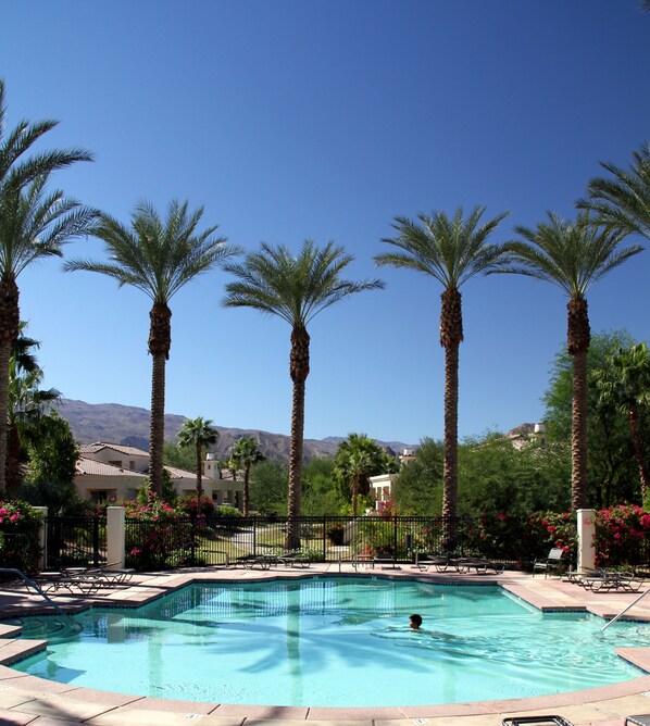 Heated pool in Puerta Azul with views of mountains.  Hot tub and club house, too