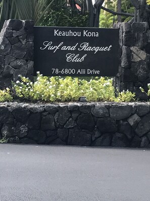 Gated entrance to the Surf and Racquet Club.