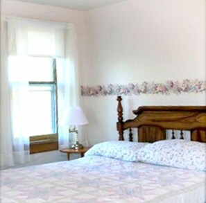 upstairs bedroom looks down at the lake