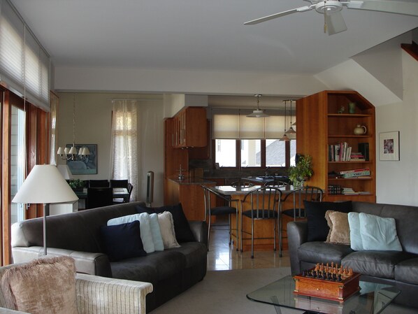 Living Room looking to kitchen and dining room