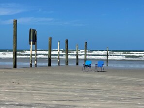 We are located at the north end of the traffic free beach. 
