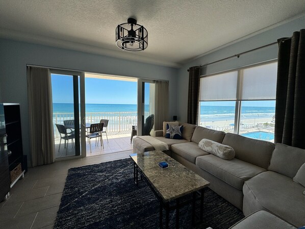We are located on the SE corner where the living rm has panoramic beach views.