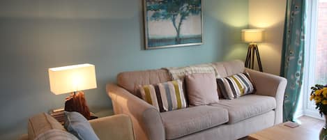 Cosy lounge area with three sofas 