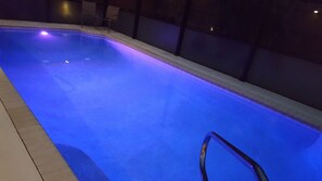 Let's swim at night in the heated and lighted pool