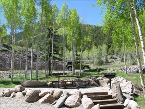 Picnic area nestled in the Aspens. Charcoal grill your favorite foods.